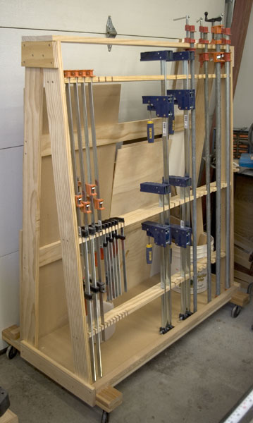 ... step instructions on how to build a wood and clamp rack for your shop